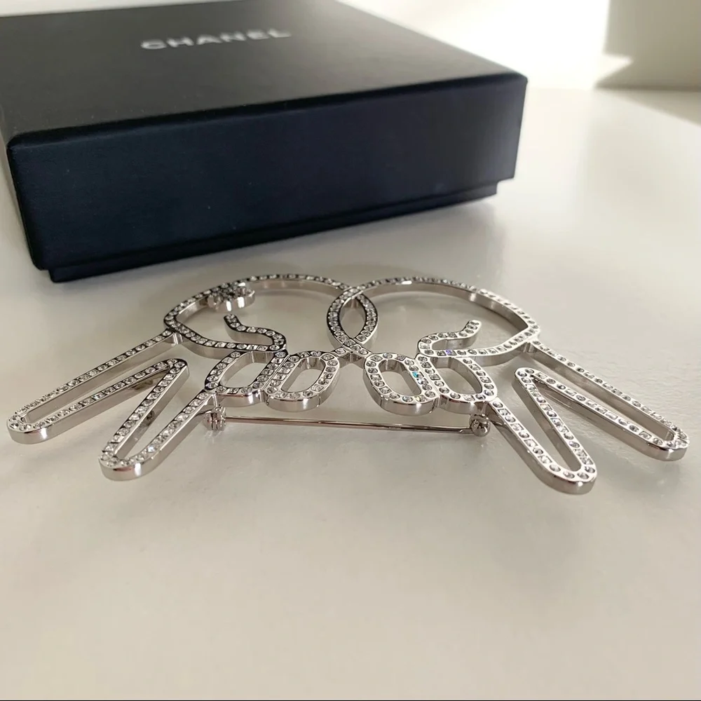 Chanel large peace hands pin